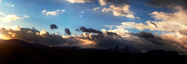 Altai Ukok the sunset over the mountains in cloudy cold weather