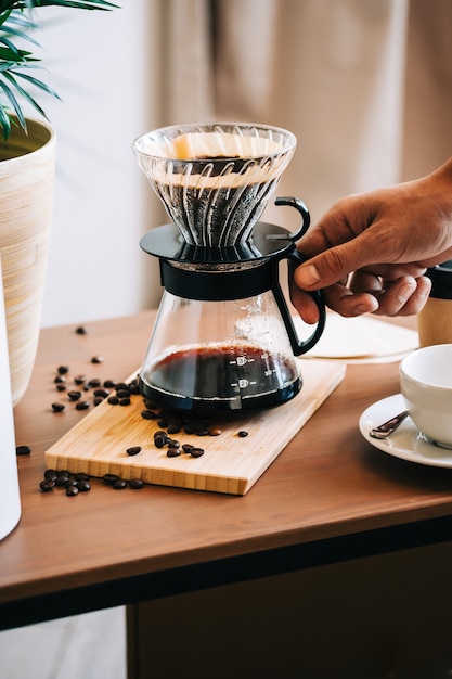 Alternative coffee brewing method, using pour over dripper and paper filter.