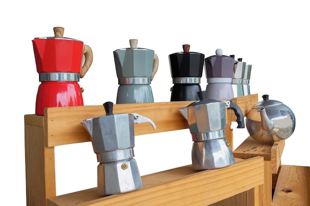 Aluminum italian espresso coffee pot caffettiera on a wood tableMoka pot