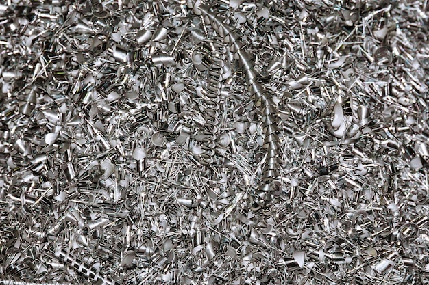 Aluminum shavings. Aluminum processing on CNC machines in production.