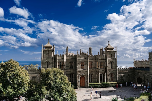 ALUPKA RUSSIA SEPTEMBER 2 2021 Vorontsov Palace in Crimea is a famous ancient landmark for tourists in Russia on the Black Sea coast