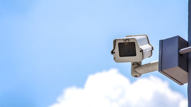 Always security reccord with Cctv camera and blue sky white clouds of long banner