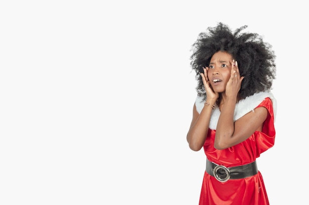 Amazed african woman with a christmas costume facial expression