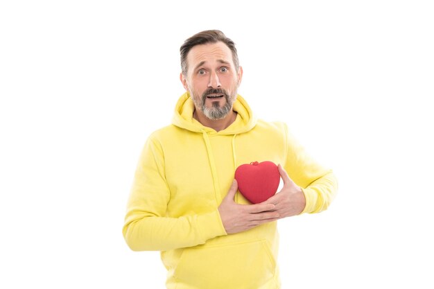 Photo amazed handsome mature man with beard and moustache in hoody hold heart shape present box symbol of love or donation isolated on white donation