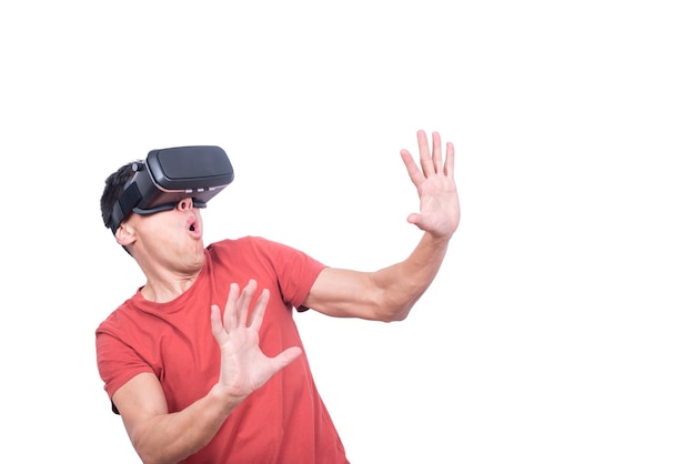 Amazed man in exploring virtual reality in VR glasses