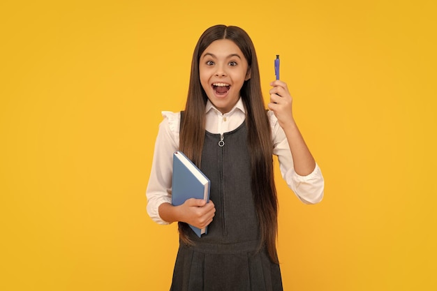 Amazed teen girl Teenager school girl study with books Learning knowledge and kids education concept Excited expression cheerful and glad