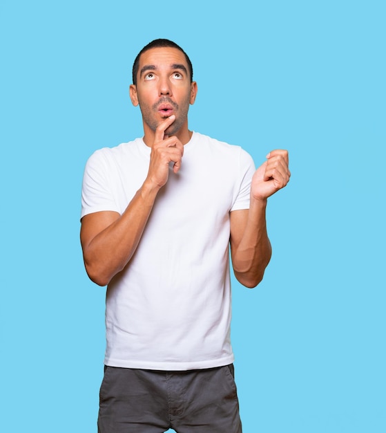 Amazed young man looking gesture