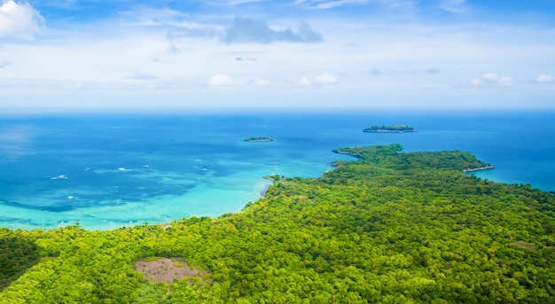 Amazing aerial view of a green tropical thailand beach with blue sea