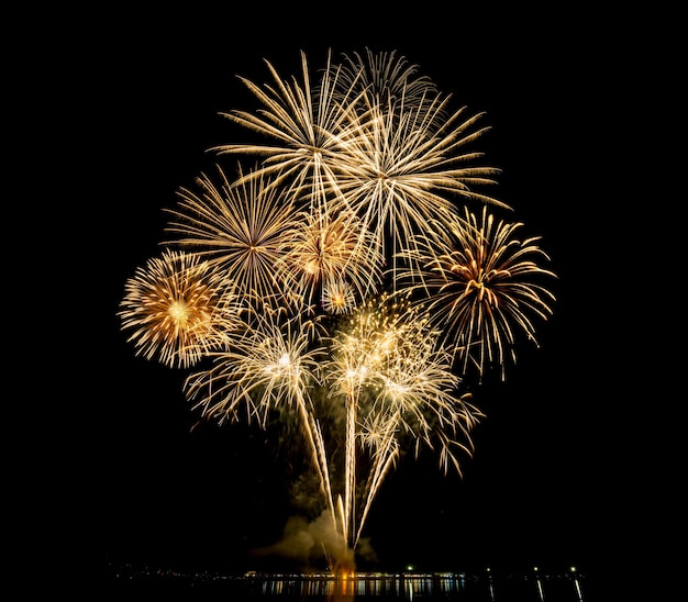 Amazing Beautiful firework on black background for celebration anniversary merry christmas eve and happy new year.