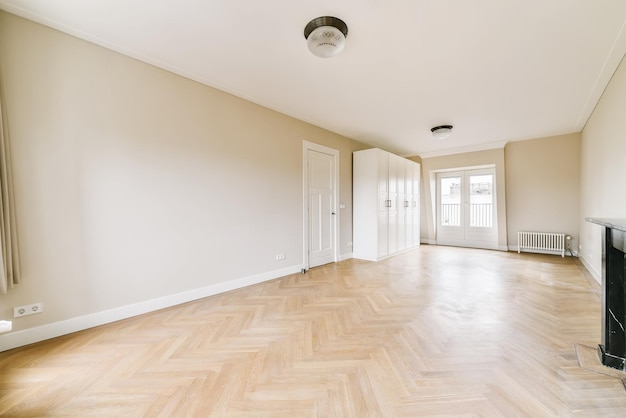 Amazing design of a room with a beautiful chandelier and parquet floor