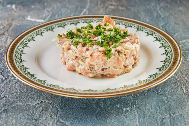 Amazing fresh and smoked salmon tartare French gourmet food