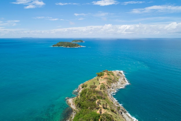 Amazing landscape nature scenery view of Beautiful tropical sea with Sea coast view in summer season image by Aerial view drone top down high angle view Located at Laem Promthep Phuket Thailand