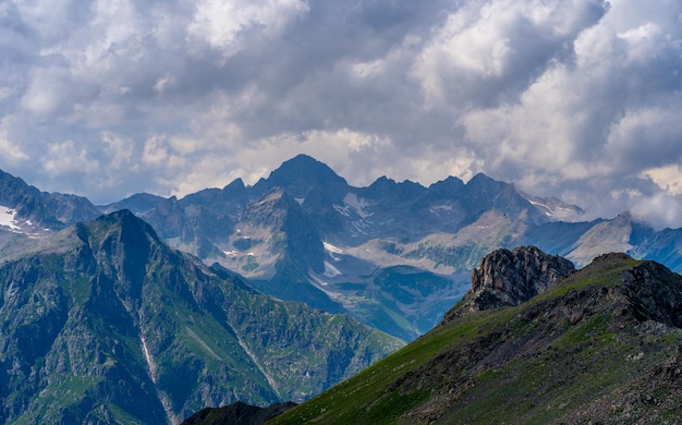 Amazing mountain landscape in summertime Mighty mountains in cloudy weather