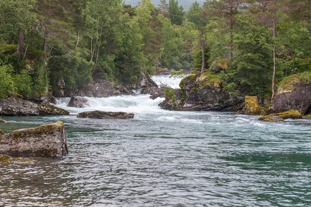 Amazing mountain river in Norway. landscape. Turquoise River. Fast flow mountain River in Norway