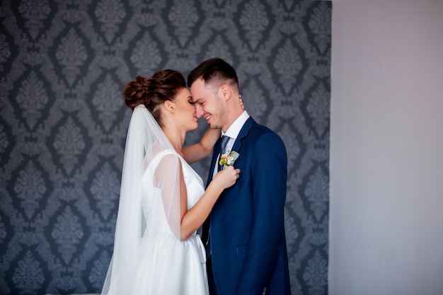 Amazing smiling wedding couple