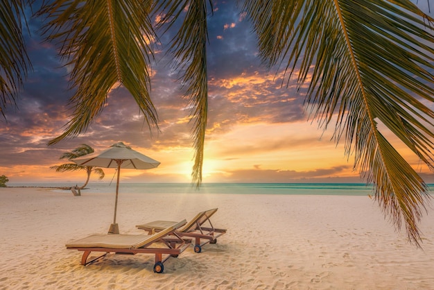 Amazing vacation beach. Couple chairs on sandy beach seashore. Summer romantic holiday concept