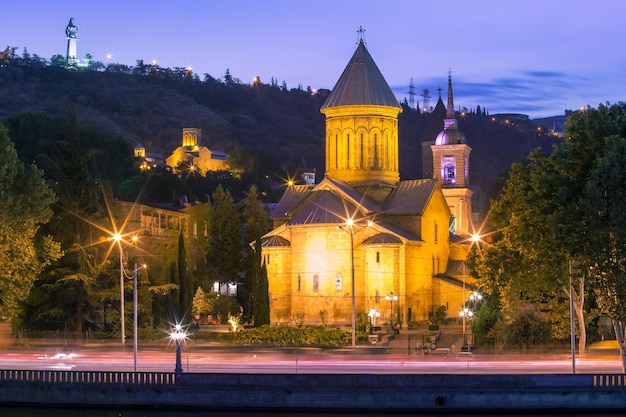 Amazing view of sioni cathedral of dormition and kura river in old town in the moonlit night tbilisi