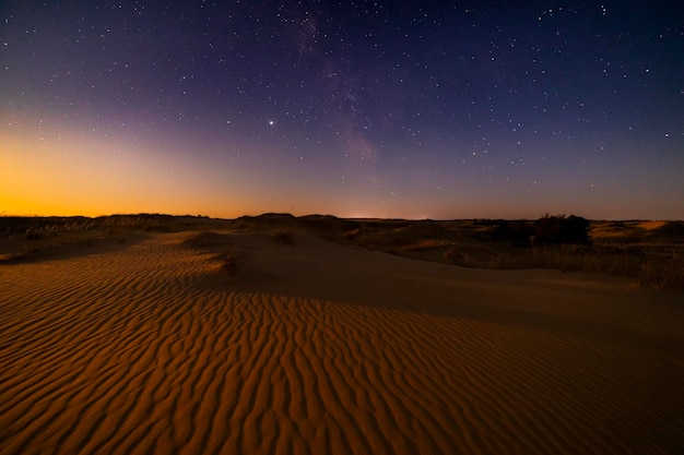 Amazing views of the Sahara desert under the night starry sky