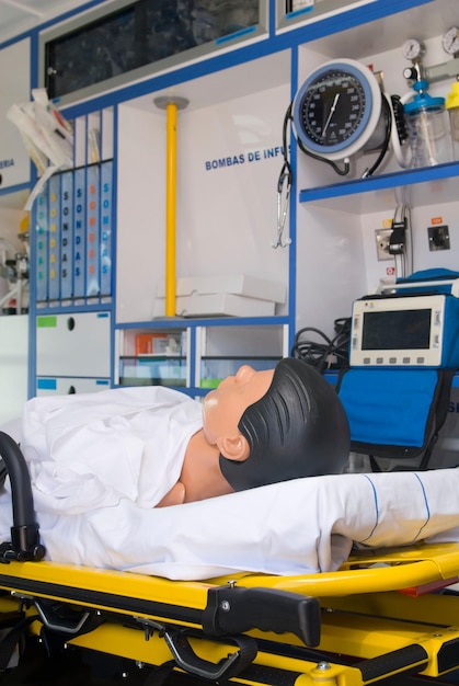 ambulance perfectly equipped with emergency equipment and dummy for first aid practices