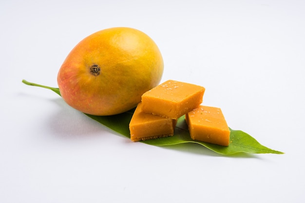 Ambyachi vadi or mango burfi or barfi or cake from India is made using authentic alphonso fruit mixed with Khoya. Served in a plate, selective focus