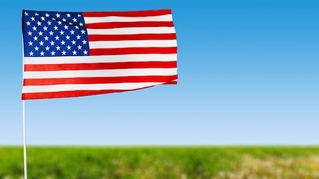 American flag against blue sky