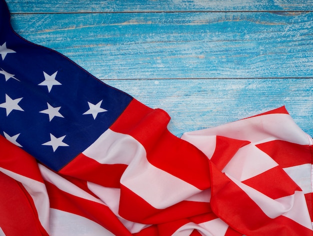 American flag on blue wooden background