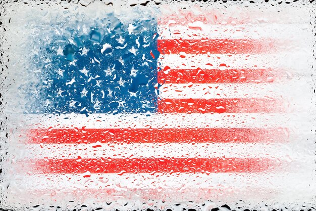 American flag Flag of USA on the background of water drops Flag with raindrops Splashes on glass