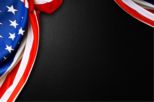 American flag folded on a black background