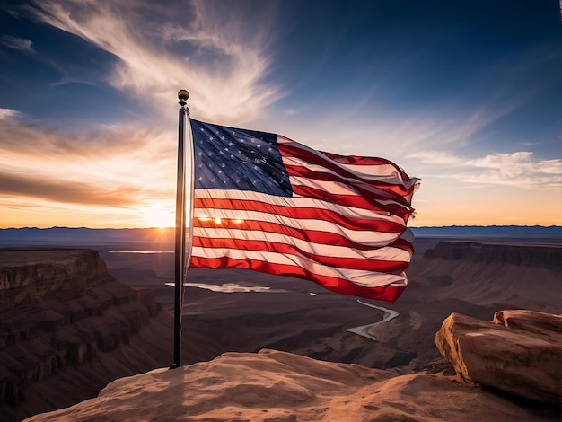 Photo american flag waving on a clifftop during sunset