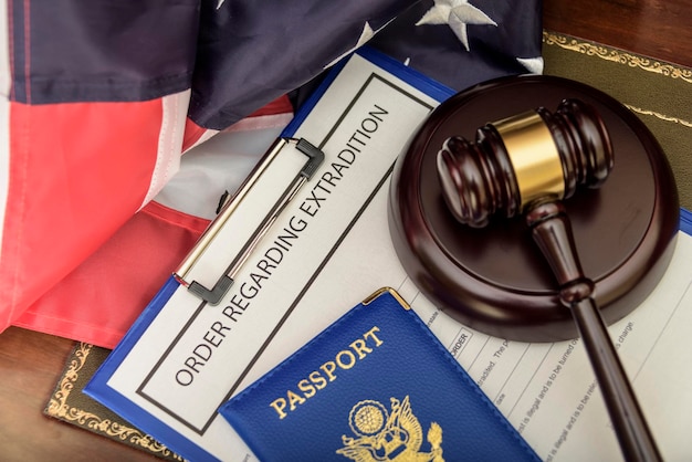 American passports and judges legal hammer on wooden desk