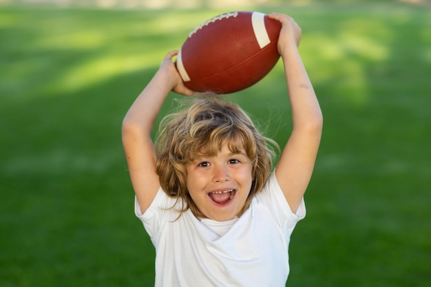 American style football american football child ready to throw a football sport kids concept sport a