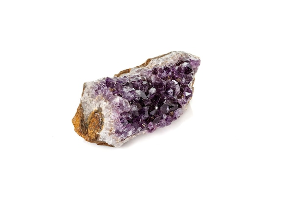 Amethyst Crystal Druse macro mineral on white background close up