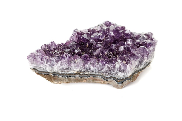 Amethyst Crystal Druse macro mineral on white background close up