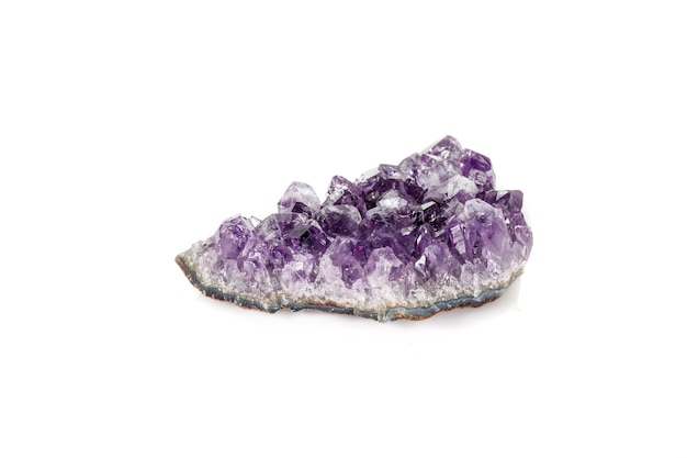 Amethyst Crystal Druse macro mineral on white background close up