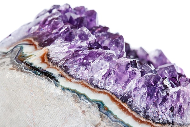 Photo amethyst crystal druse macro mineral on white background