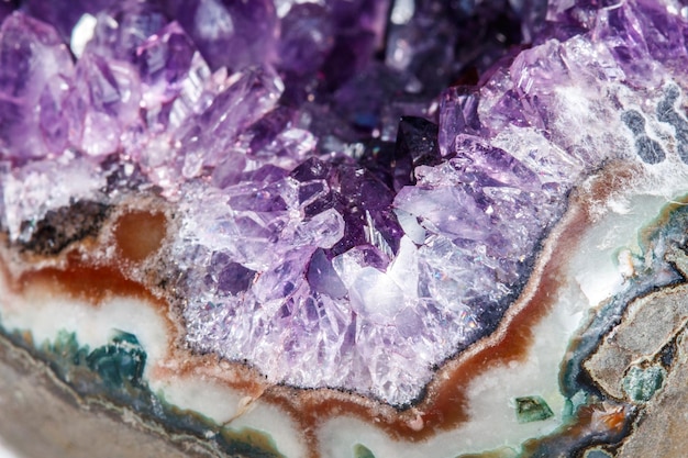 Amethyst Crystal Druse macro mineral on white background