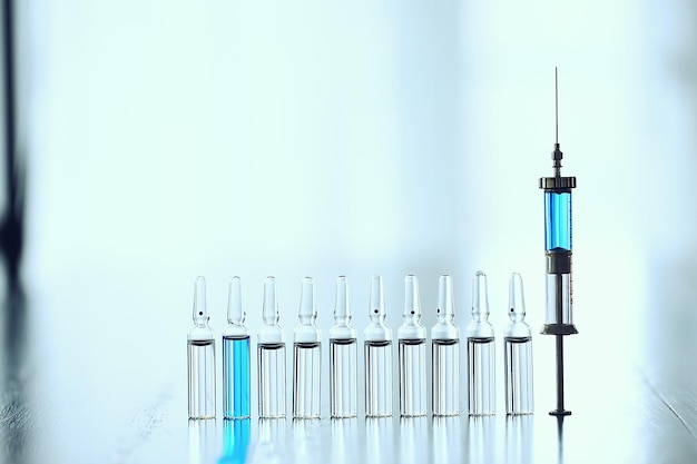 ampoules medicine vaccine concept, abstract background, vaccination virus protection