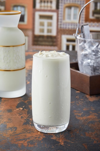 Amritsari Lassi served in glass isolated on table top view of punjabi culture