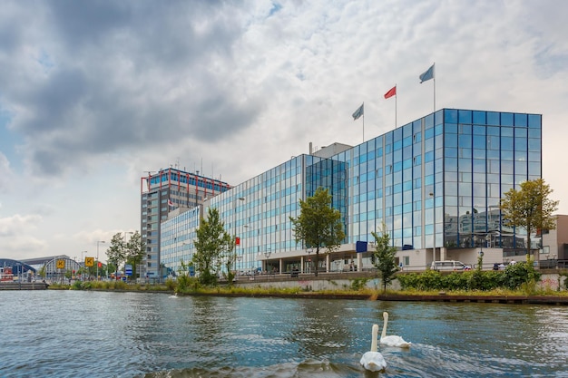 Amsterdam canal and modern building Holland