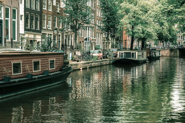 Amsterdam canal with boats Holland Netherlands