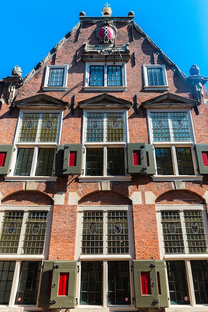 Amsterdam, Netherlands, Europe, September Danish traditional facade of a building in Amsterdam. High quality photo