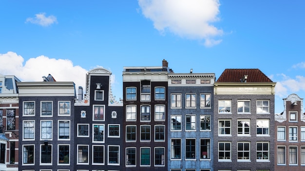 Amsterdam Netherlands Views of houses and clear blue skies Famous Danish houses Cityscape in the daytime Travel photography