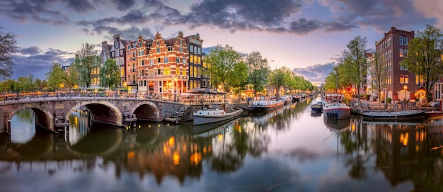 Amsterdam Panoramic view of the downtown of Amsterdam Traditional houses and bridges of Amsterdam