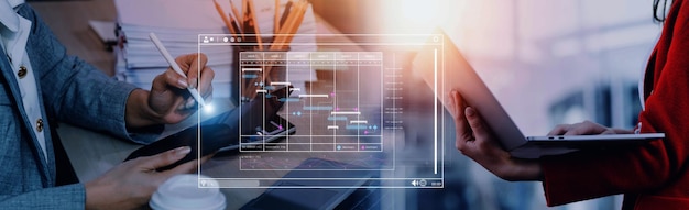 Analyst working with computer in Business Analytics and Data Management System to make report with KPI and metrics connected to database Corporate strategy for finance operations sales marketing