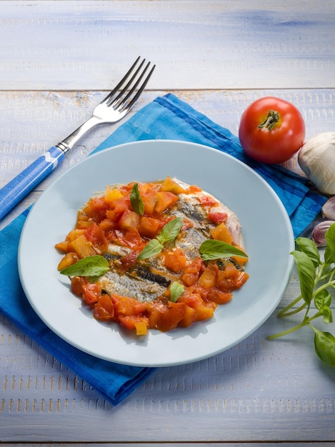 Anchovy with capsicum and tomato sauce