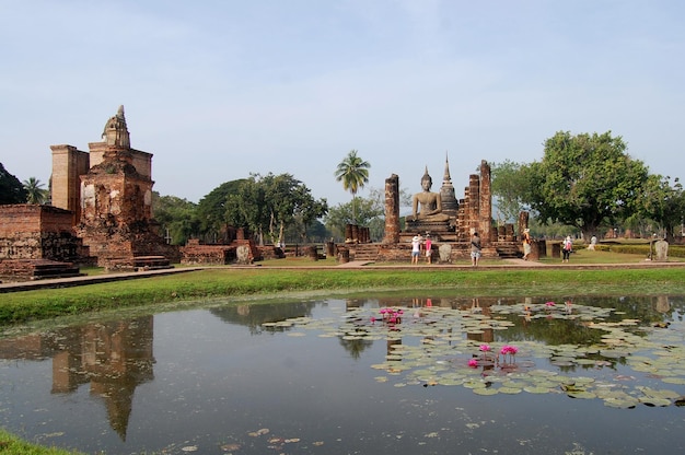 Ancient antiquity architecture and antique ruins building for thai people travelers travel visit respect praying at Si Satchanalai Historical Park and Unesco World Heritage Site in Sukhothai Thailand