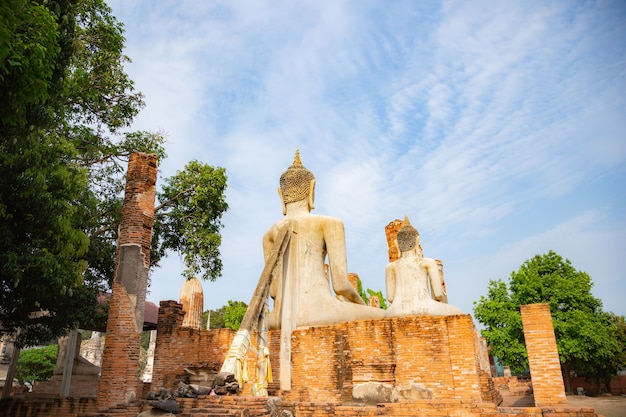 Ancient buddha and pagoda statue in Wat Mahathat