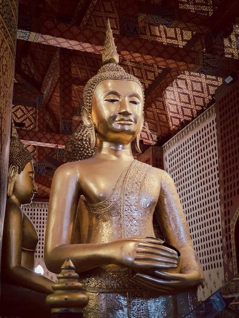 Ancient buddha statue in wat Thai or Thai temple Giant Buddha god worship Asian architecture art