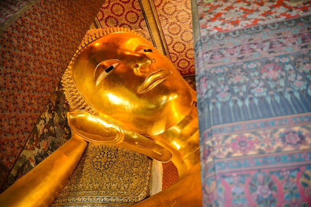 Ancient buddha statue in wat Thai or Thai temple Giant Buddha god worship Asian architecture