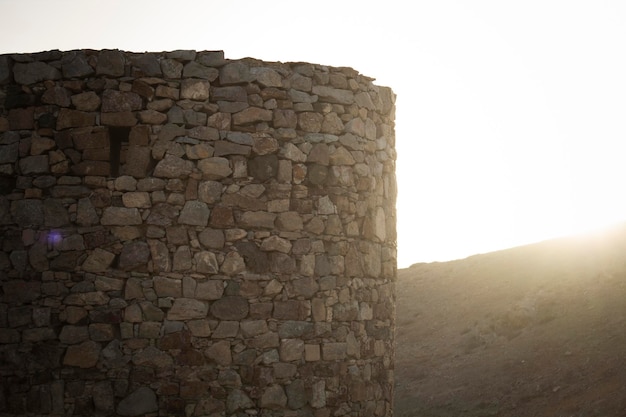 Ancient fortress walls at sunset